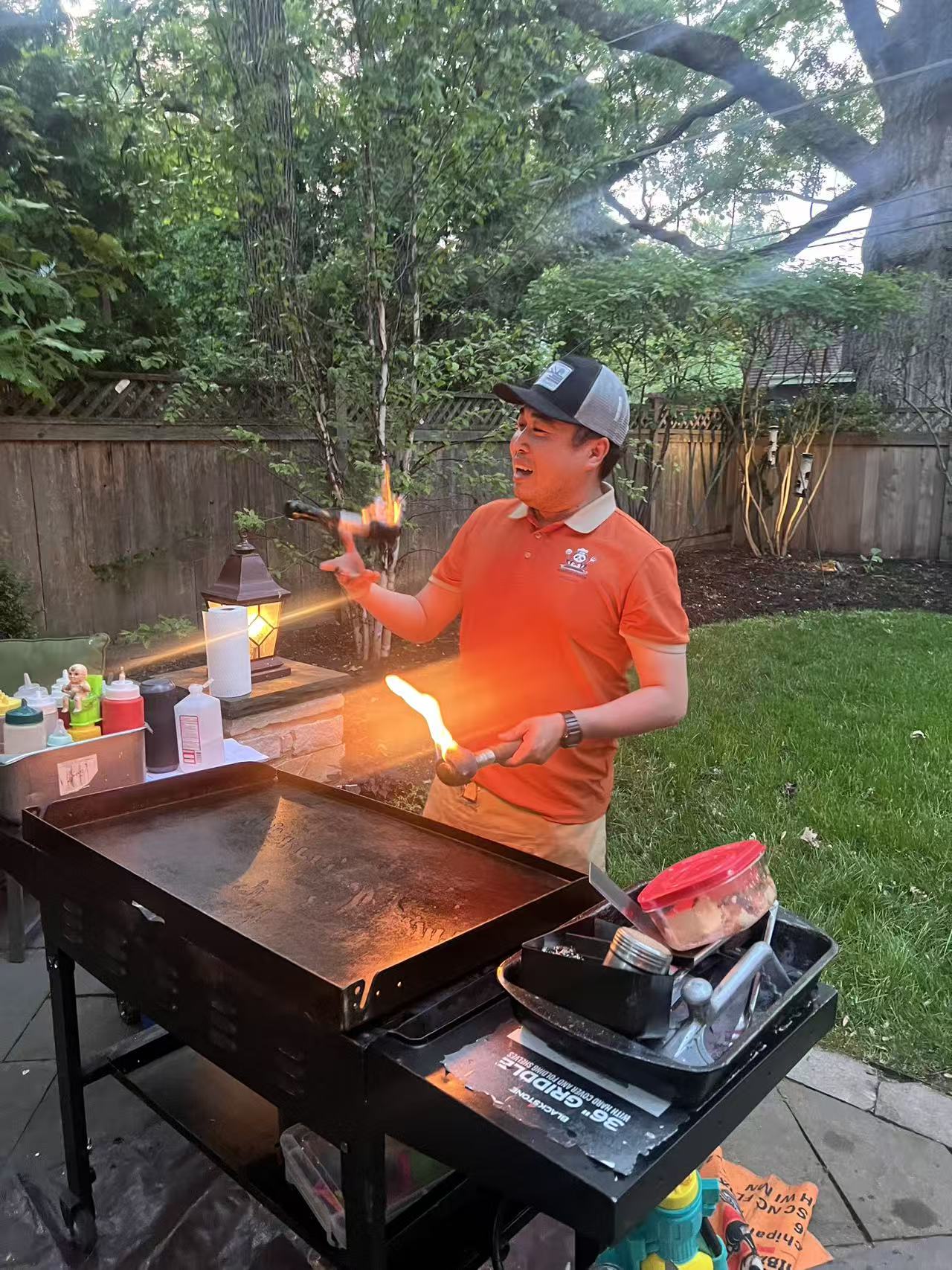 Atlanta hibachi chef performing live cooking show at home